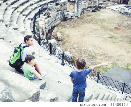 mother with little sons on vacation visiting ancient colosseum, summer tourism, lifestyle people concept 88489134