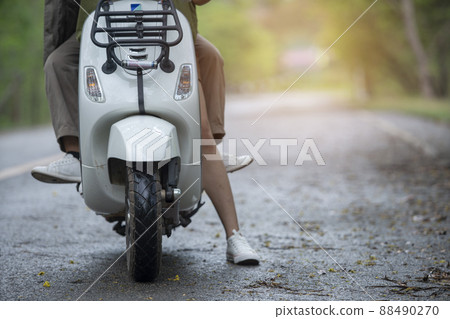 Classic scooter motorbike travel on the nature road 88490270