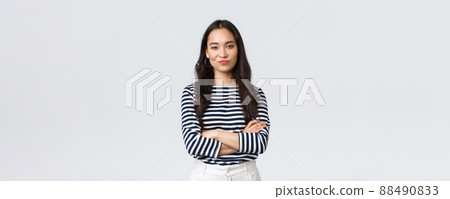 Lifestyle, beauty and fashion, people emotions concept. Skeptical and judgemental asian female office manager looking picky, smirk and pouting dissatisfied, cross arms chest Lifestyle, beauty and fashion, people emotions concept. Skeptical and judgemental asian female office manager looking picky, smirk and pouting dissatisfied, cross arms chest 88490833
