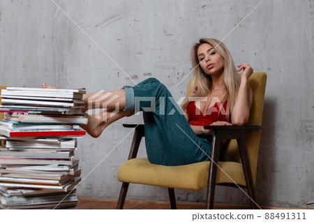 Glamorous sexy young woman with blond hair in a - Stock Photo