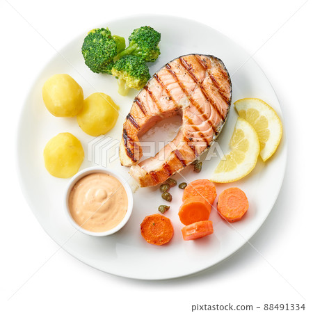 plate of grilled salmon steak and vegetables plate of grilled salmon steak and vegetables 88491334