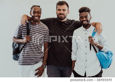 A photo of a group of happy students isolated on white background. A photo of a group of happy students isolated on white background. 88493045