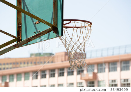 Horizontal position of basketball goal in the school playground Horizontal position of basketball goal in the school playground 88493699