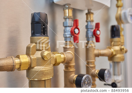 Plumbing service. copper pipeline of a heating system in boiler room. Plumbing service. copper pipeline of a heating system in boiler room. 88493956