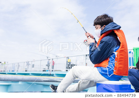 Boys enjoying fishing 88494739