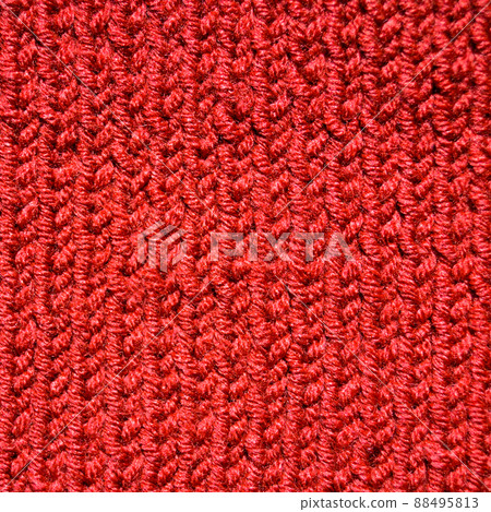 Handmade knitted fabric red wool background texture 88495813