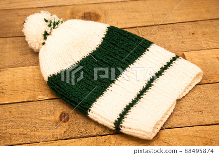 Handmade wool knitted winter green and white hat 88495874