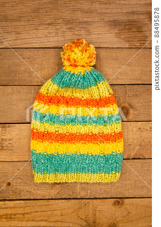 Handmade wool knitted winter yellow orange and blue hat 88495878