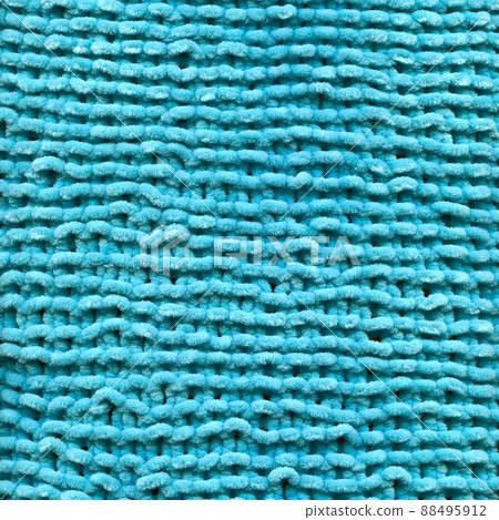 Handmade knitted fabric turquoise wool background texture Handmade knitted fabric turquoise wool background texture 88495912