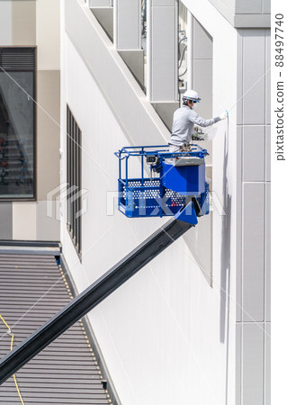 Construction site, aerial work platform, sealing work, caulking Construction site, aerial work platform, sealing work, caulking 88497740