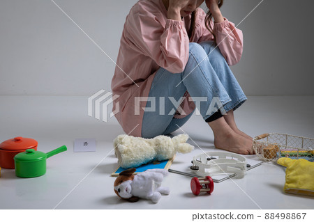 Childminder holding a head Childminder holding a head 88498867