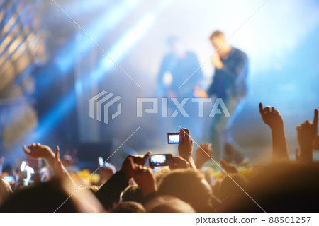 It's all about the fans. Shot of fans enjoying an outdoor music festival. 88501257