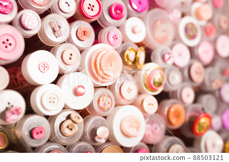 Buttons in plastic containers in store Buttons in plastic containers in store 88503121