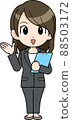 Business woman who guides with a binder 88503172