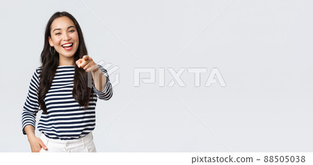 Lifestyle, beauty and fashion, people emotions concept. Happy cheerful asian girl praising you, picking person, found excellent employee for job position, pointing camera and smiling Lifestyle, beauty and fashion, people emotions concept. Happy cheerful asian girl praising you, picking person, found excellent employee for job position, pointing camera and smiling 88505038