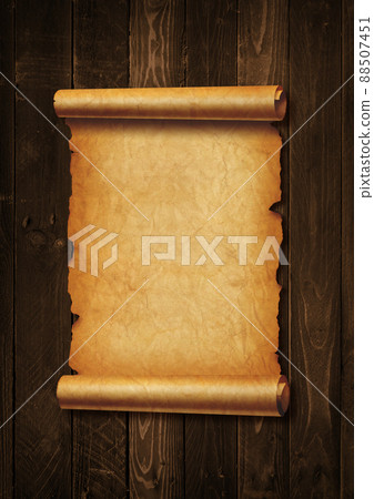 Old mediaeval paper sheet. Parchment scroll on a wood board Old mediaeval paper sheet. Parchment scroll on a wood board 88507451