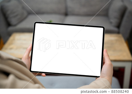 Mockup screen of a digital tablet touchpad in a woman hands 88508240
