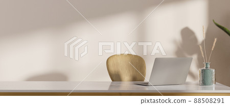 Minimal workspace interior with laptop computer and copy space on white tabletop 88508291