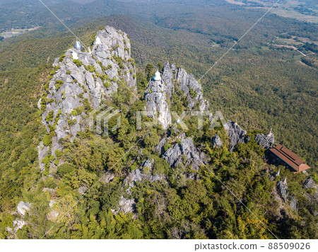 Beautiful aerial view of the floating pagoda in temple of Wat Chaloem Phra Kiat, One of the most tourist attraction place in Lampang province of Thailand. Beautiful aerial view of the floating pagoda in temple of Wat Chaloem Phra Kiat, One of the most tourist attraction place in Lampang province of Thailand. 88509026