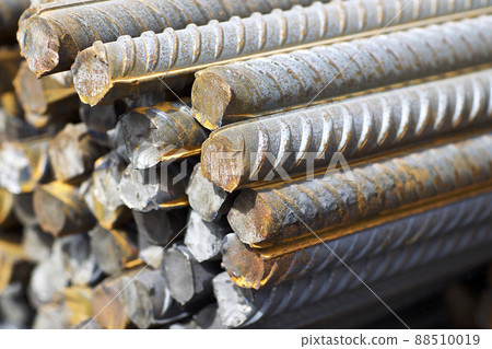Reinforcing bars with a periodic profile in the packs are stored in the metal products warehouse Reinforcing bars with a periodic profile in the packs are stored in the metal products warehouse 88510019