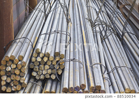 Reinforcing bars with a periodic profile in the packs are stored in the metal products warehouse Reinforcing bars with a periodic profile in the packs are stored in the metal products warehouse 88510034
