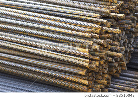 Reinforcing bars with a periodic profile in the packs are stored in the metal products warehouse Reinforcing bars with a periodic profile in the packs are stored in the metal products warehouse 88510042
