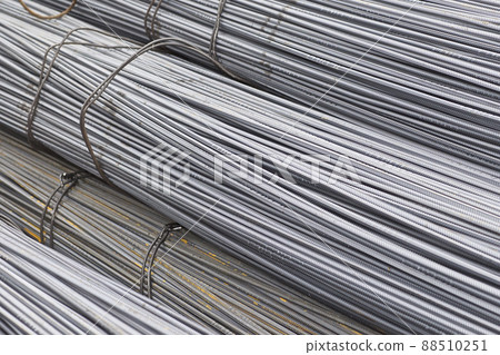 Reinforcing bars with a periodic profile in the packs are stored in the metal products warehouse Reinforcing bars with a periodic profile in the packs are stored in the metal products warehouse 88510251