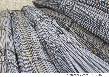 Reinforcing bars with a periodic profile in the packs are stored in the metal products warehouse Reinforcing bars with a periodic profile in the packs are stored in the metal products warehouse 88510255