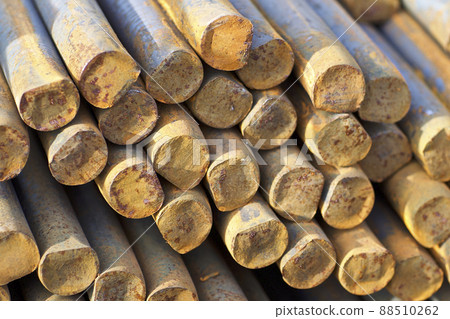 Metal profile of round section in packs at the warehouse of metal products Metal profile of round section in packs at the warehouse of metal products 88510262