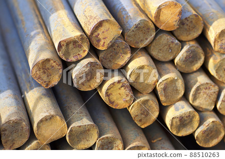 Metal profile of round section in packs at the warehouse of metal products Metal profile of round section in packs at the warehouse of metal products 88510263