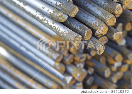 Metal profile of round section in packs at the warehouse of metal products Metal profile of round section in packs at the warehouse of metal products 88510273