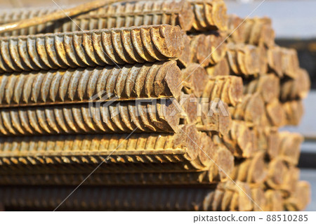Reinforcing bars with a periodic profile in the packs are stored in the metal products warehouse Reinforcing bars with a periodic profile in the packs are stored in the metal products warehouse 88510285