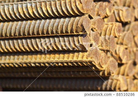 Reinforcing bars with a periodic profile in the packs are stored in the metal products warehouse Reinforcing bars with a periodic profile in the packs are stored in the metal products warehouse 88510286