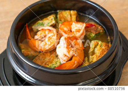 Sour soup made of Tamarind Paste with Shrimps and Vegetable Omelet Sour soup made of Tamarind Paste with Shrimps and Vegetable Omelet 88510736