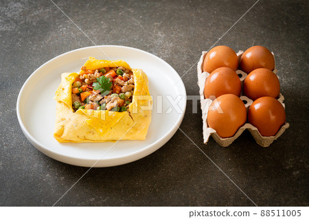 egg wrap or stuffed egg with minced pork and vegetable egg wrap or stuffed egg with minced pork and vegetable 88511005