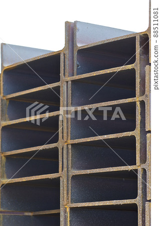 Metal profile beam in packs at the warehouse of metal products Metal profile beam in packs at the warehouse of metal products 88511081