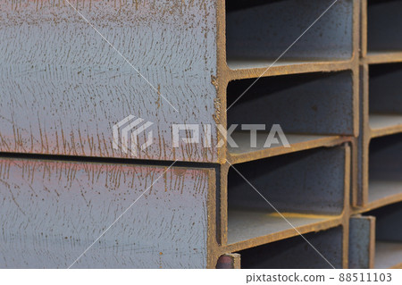 Metal profile beam in packs at the warehouse of metal products 88511103