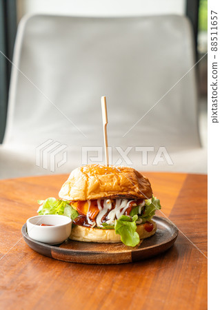 beef burger with cheese and sauce 88511657