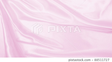 Smooth elegant pink silk or satin texture as wedding background. Luxurious background design Smooth elegant pink silk or satin texture as wedding background. Luxurious background design 88511727