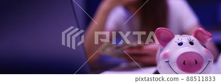 Female try to save up in moneybox Female try to save up in moneybox 88511833