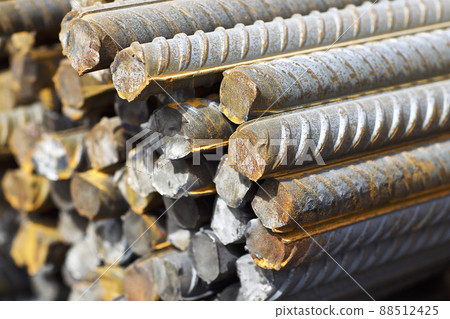 Reinforcing bars with a periodic profile in the packs are stored in the metal products warehouse Reinforcing bars with a periodic profile in the packs are stored in the metal products warehouse 88512425