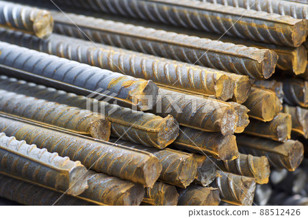 Reinforcing bars with a periodic profile in the packs are stored in the metal products warehouse Reinforcing bars with a periodic profile in the packs are stored in the metal products warehouse 88512426