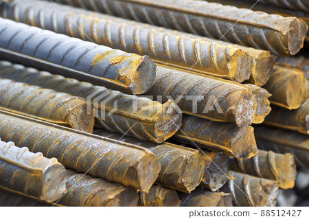 Reinforcing bars with a periodic profile in the packs are stored in the metal products warehouse Reinforcing bars with a periodic profile in the packs are stored in the metal products warehouse 88512427