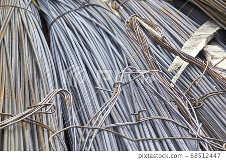 Reinforcing bars with a periodic profile in the packs are stored in the metal products warehouse Reinforcing bars with a periodic profile in the packs are stored in the metal products warehouse 88512447