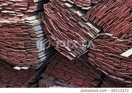 Metal profile strip in packs at the warehouse of metal products 88512872