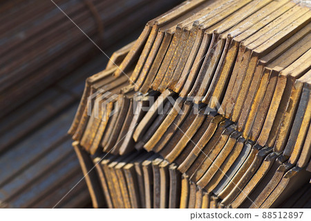 Metal profile strip in packs at the warehouse of metal products 88512897