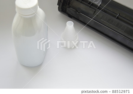 Charging the laser printer cartridge with toner powder 88512971