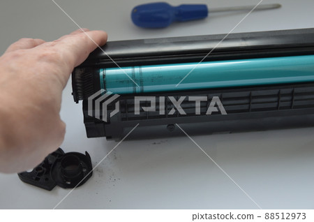 Charging the laser printer cartridge with toner powder 88512973