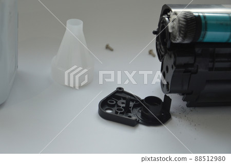 Charging the laser printer cartridge with toner powder 88512980