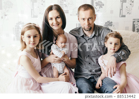 portrait of a happy family with three children. portrait of a happy family with three children. 88513442